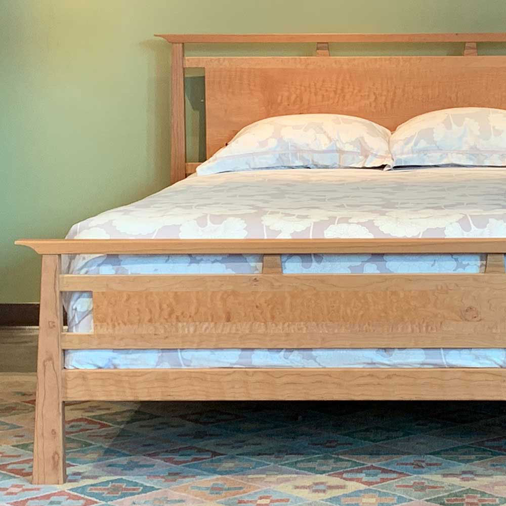 queen mendon bed in solid cherry with quilted maple panel