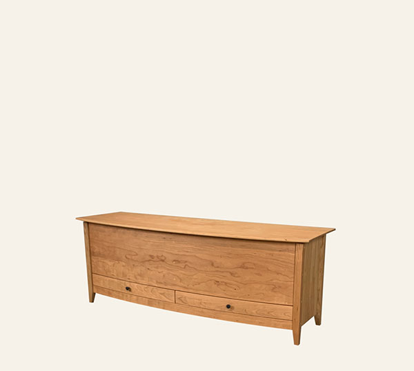 blanket chest with curved front and two drawers at bottom