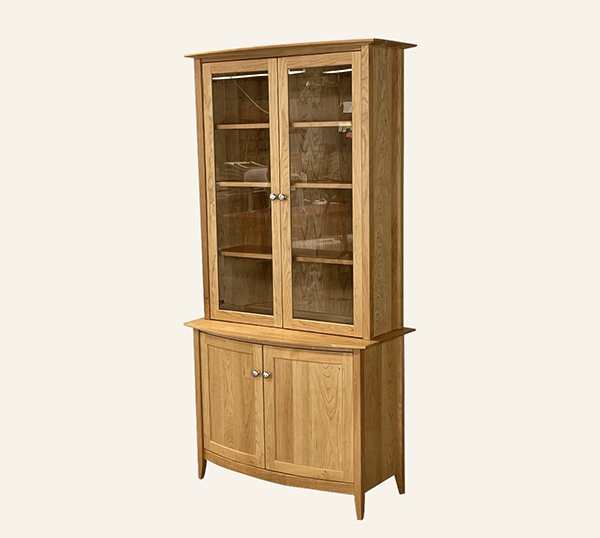 closed cabinet bottom with glass bookcase on top