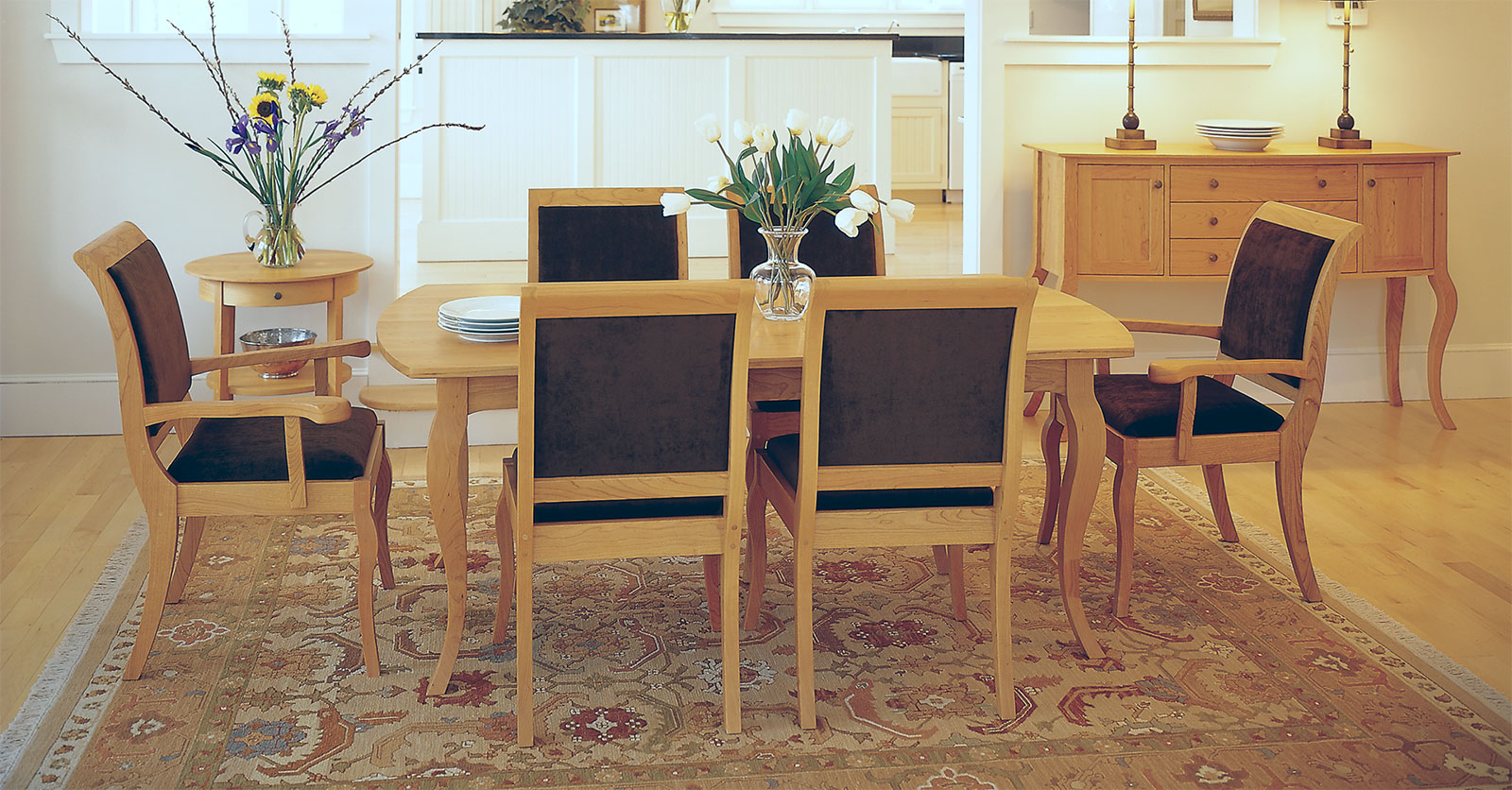 birch wood dining set with green velvet upholstered chairs