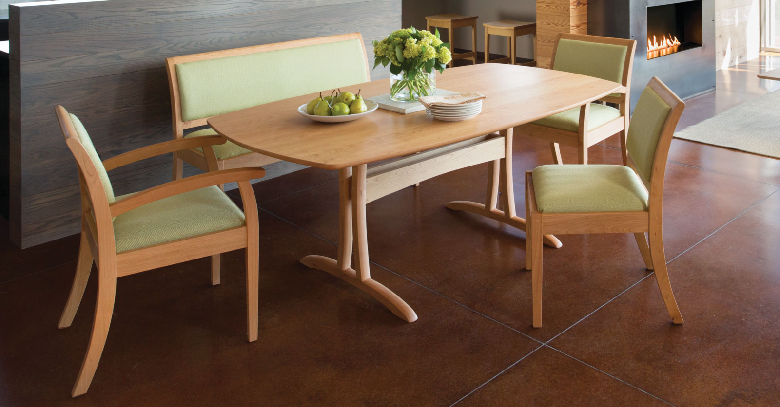 lovely transitional light wood table with chairs and a bench