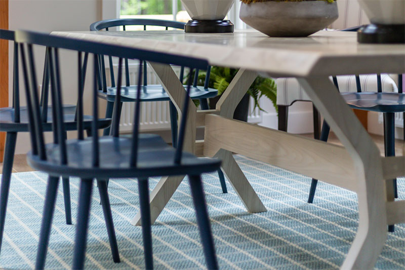 grey table with black chairs