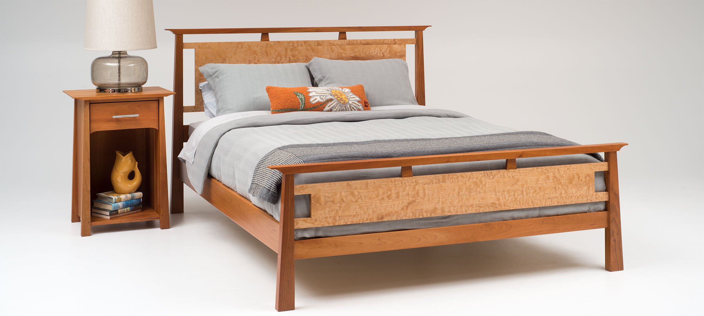 calm bedroom with birch new england panel bed and nightstand