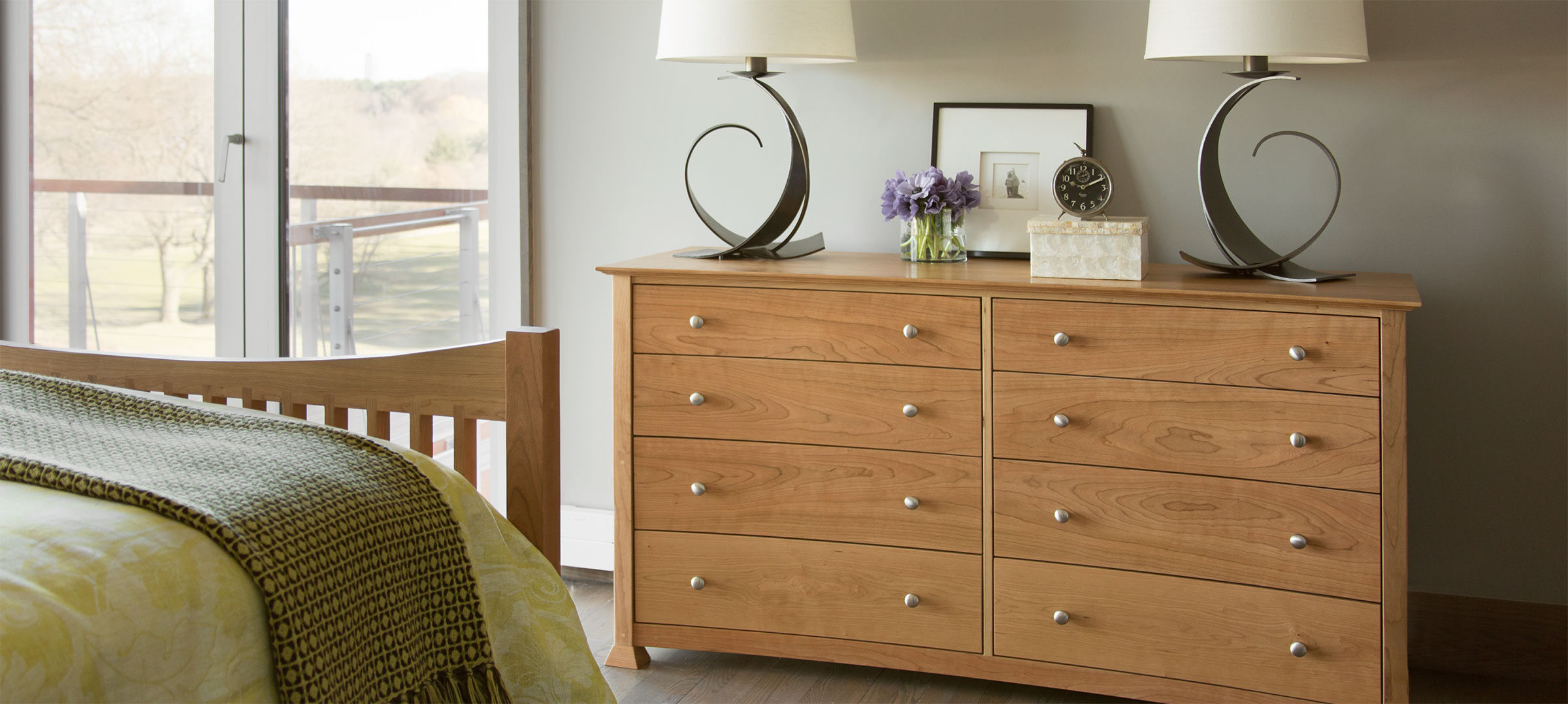 a cherry 8 drawer reading dresser and footboard