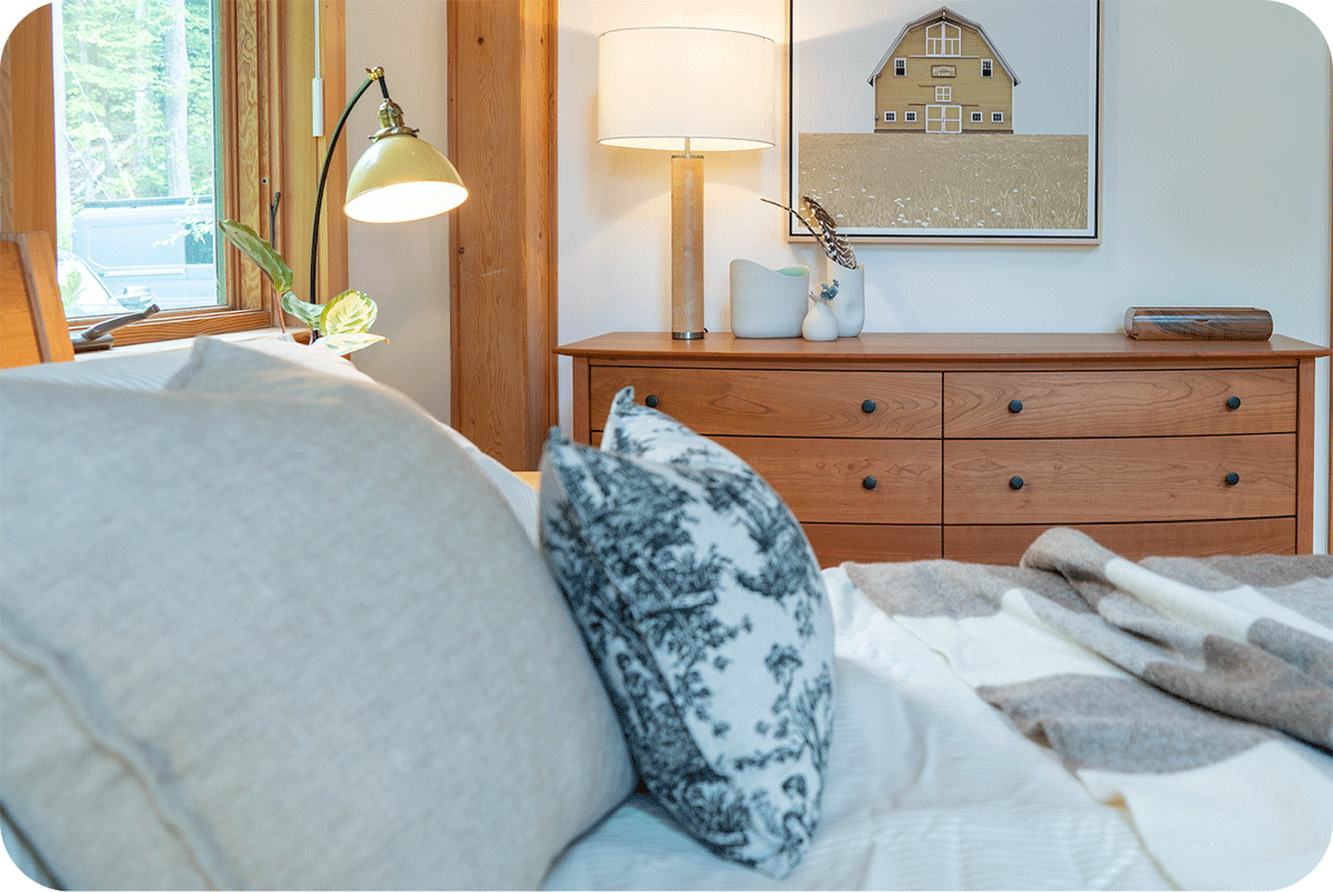 cozy bedroom with cherry chelsea dresser