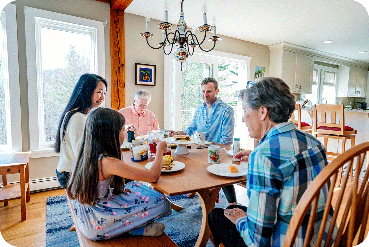 a family having breakfast at a Vernon dining table