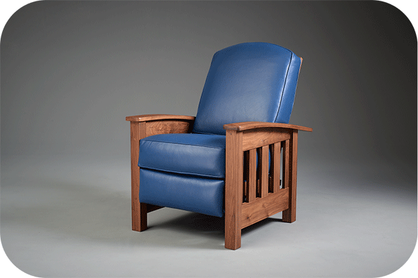 mission style recliner with royal blue leather and stained oak frame