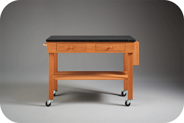 cherry worktable with soapstone top and casters