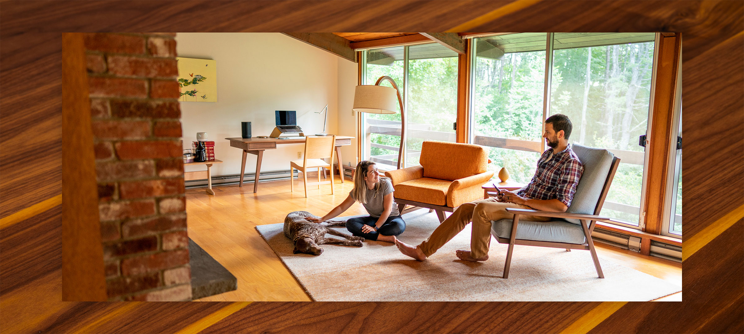 a couple and their dog in a cool modern house