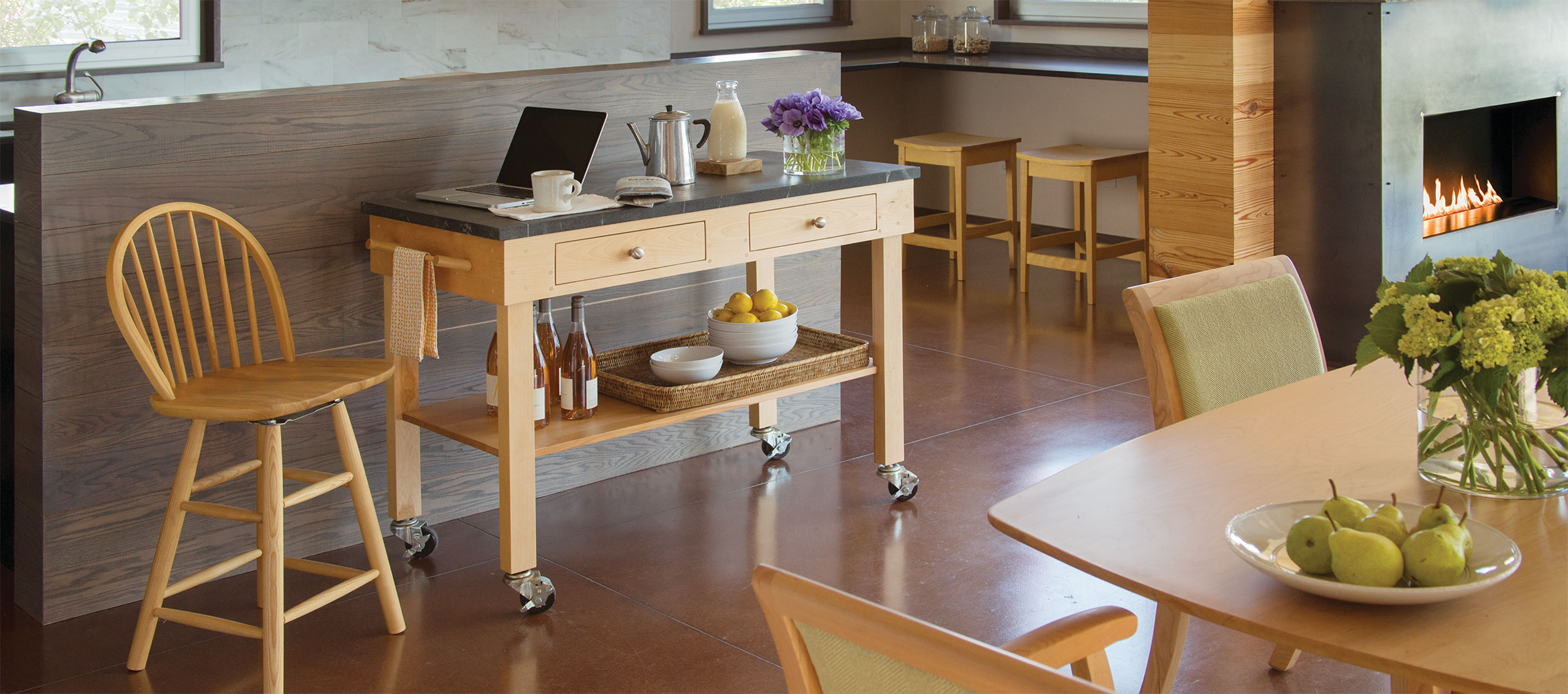 pompy barstools, prep table and dining set in a cool modern house
