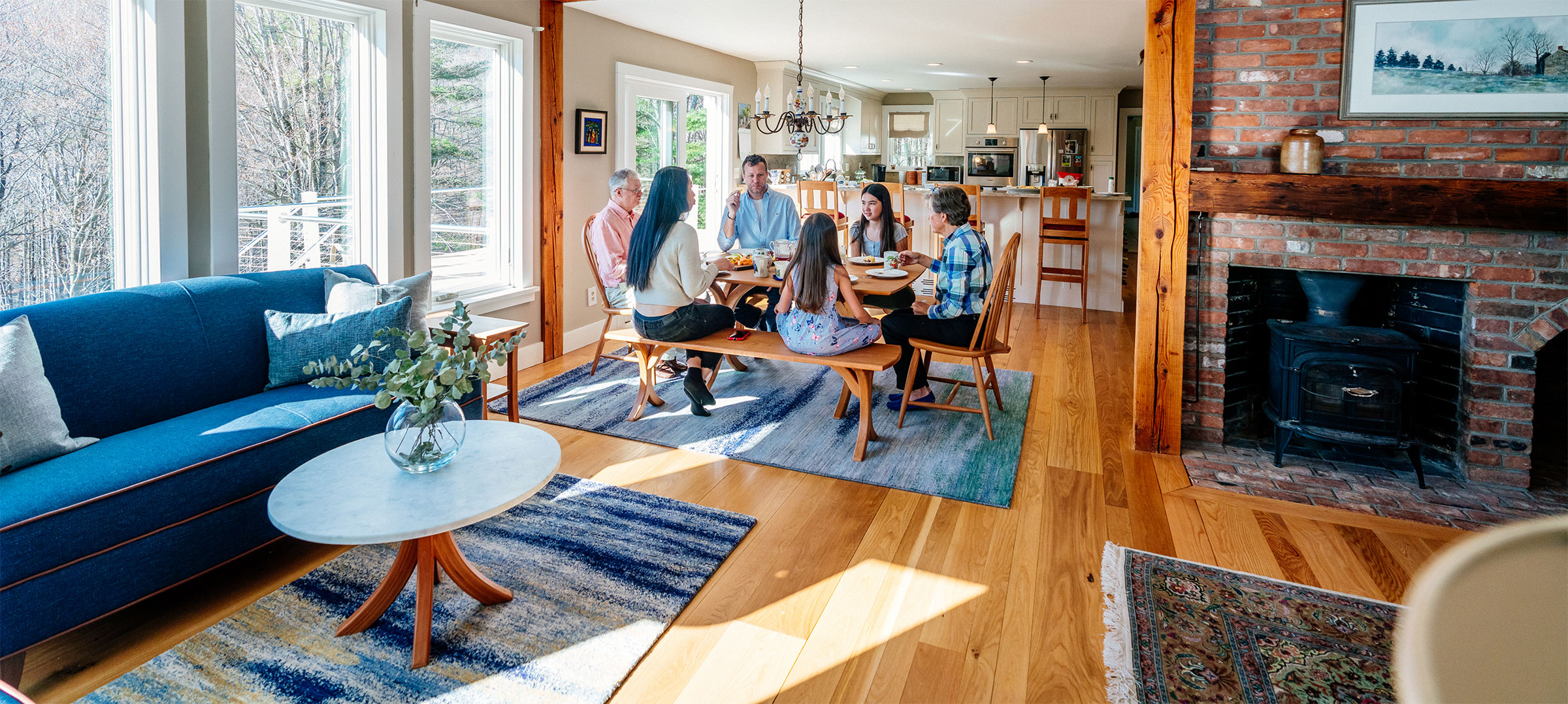 family sitting around breakfast table