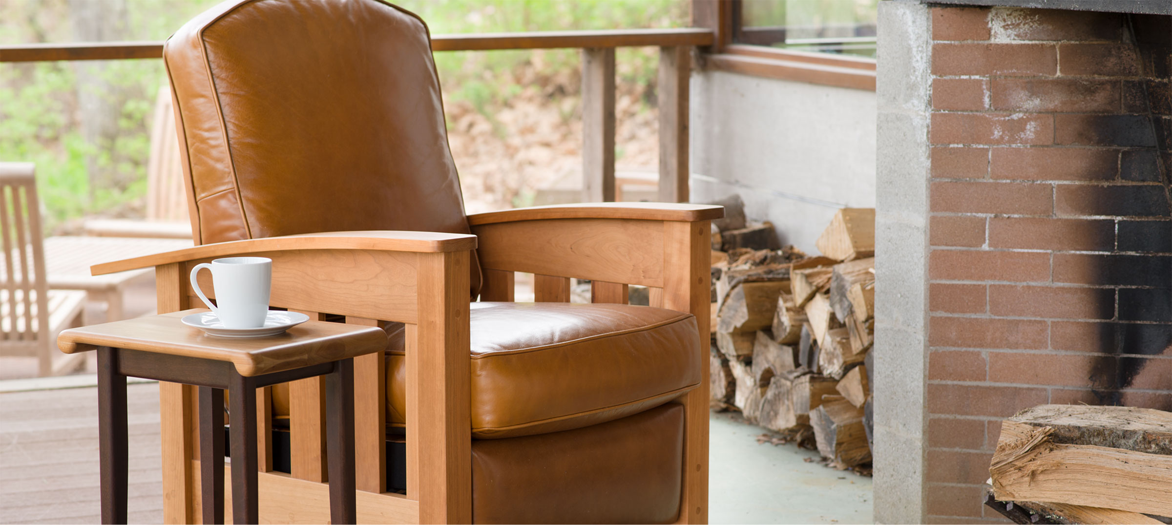 a cherry framed mission recliner with beige leather
