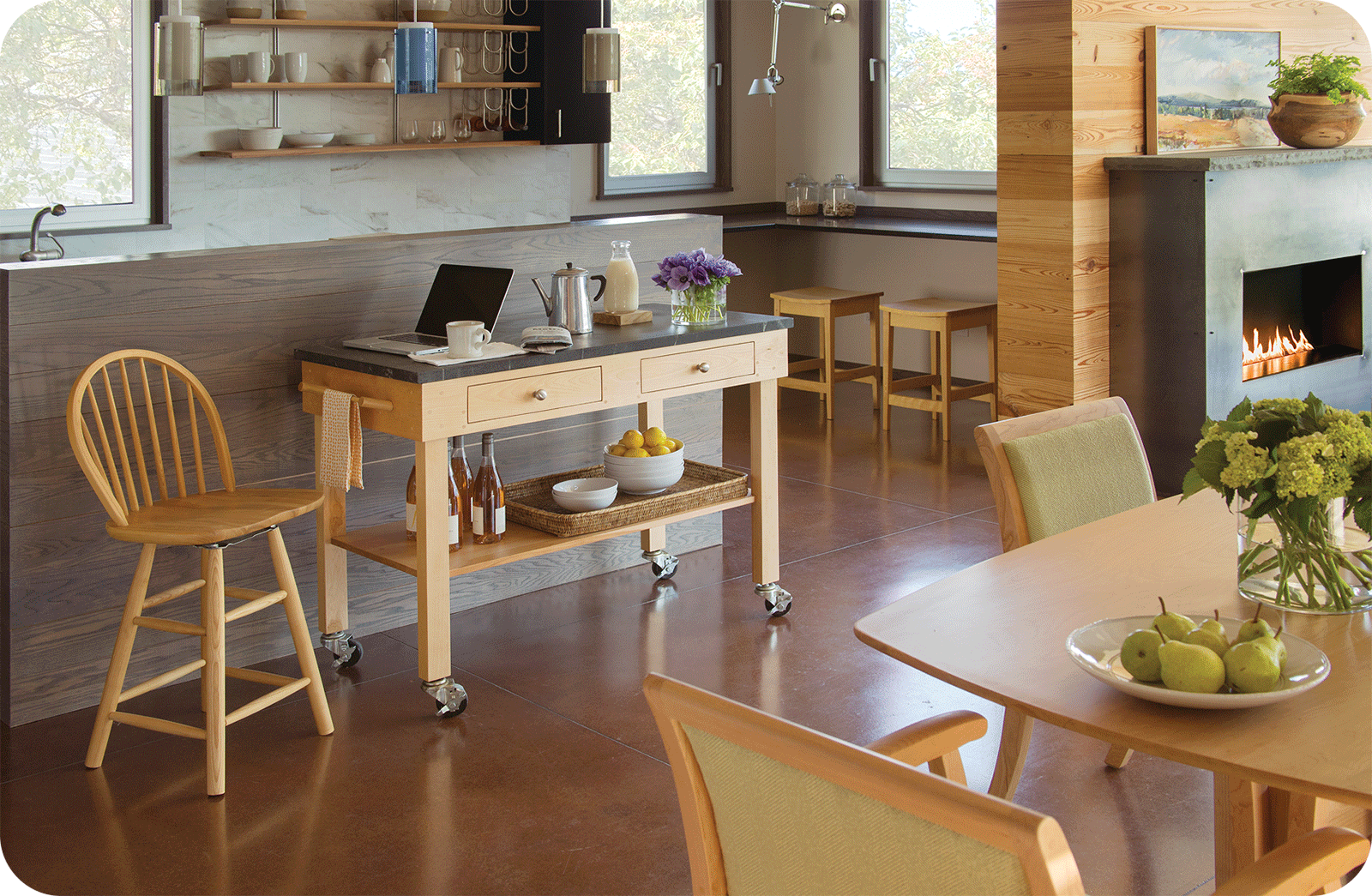 pompy barstools, prep table and dining set in a cool modern house