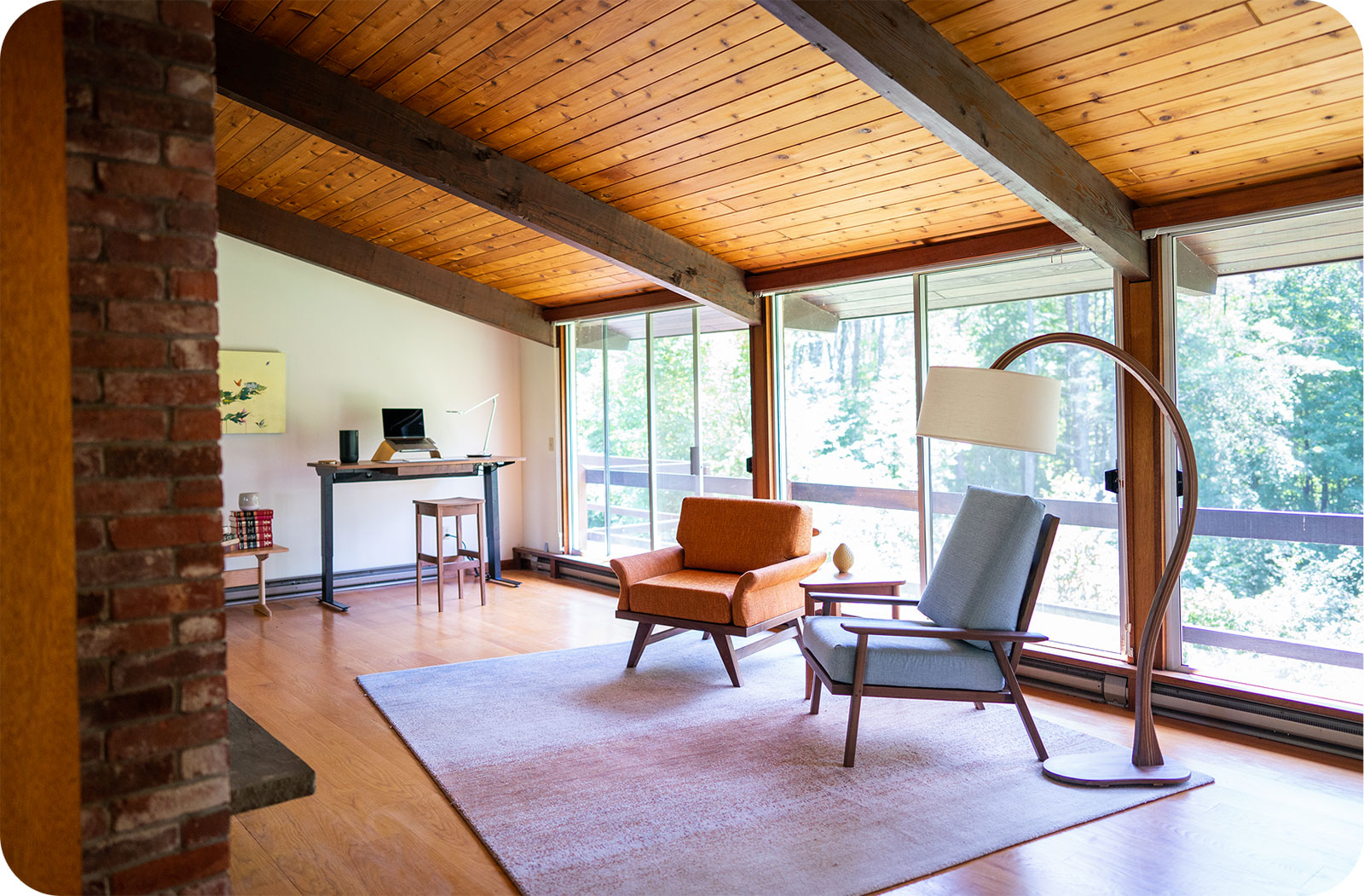 arlington & westmore chairs in a modern home with a wall of windows