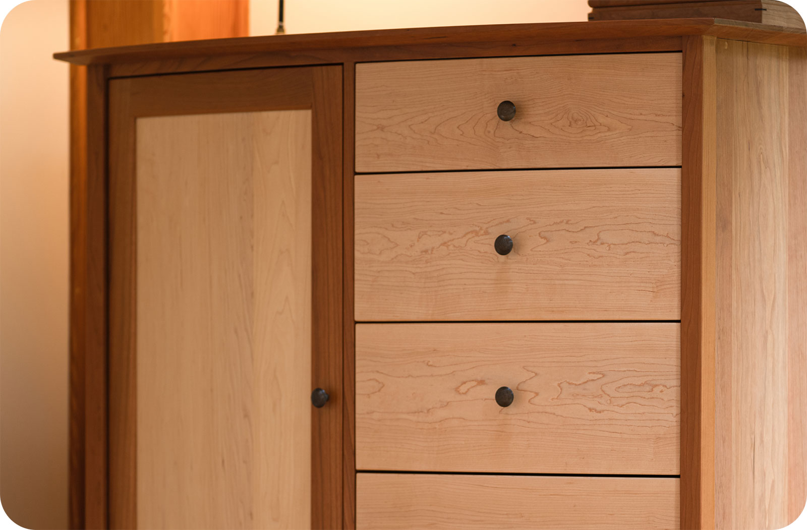 close up of a maple and cherry wardrobe