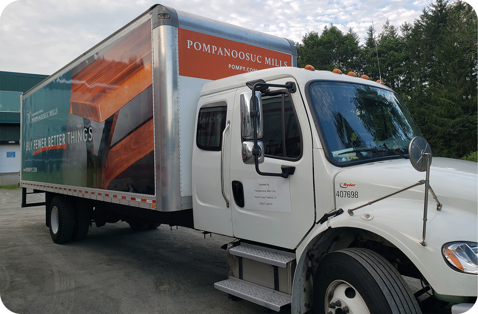 Pompanoosuc Mills delivery truck shown in three-quarter view.