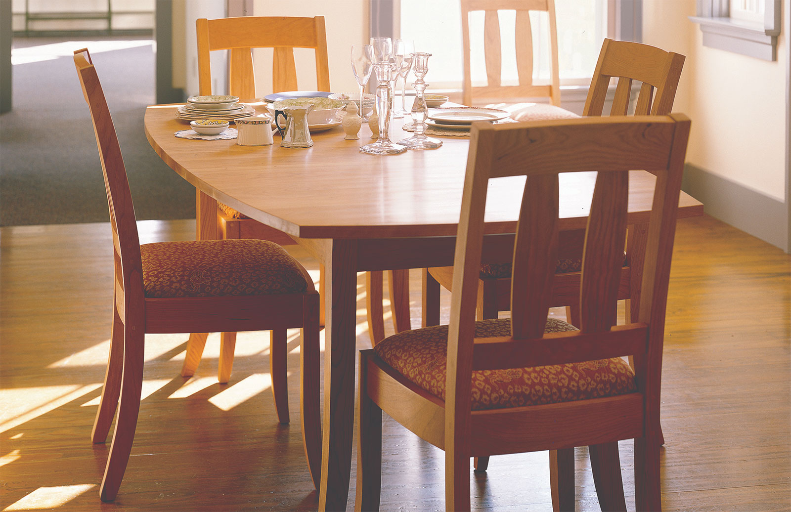 sun shining on a breakfast dining table