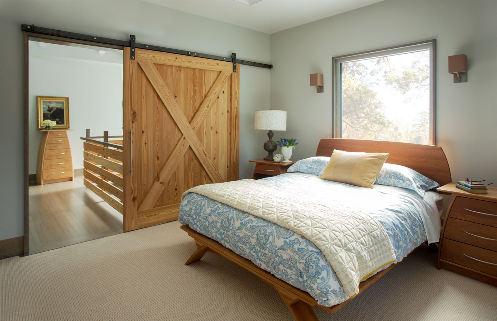 bedroom with sliding barn door