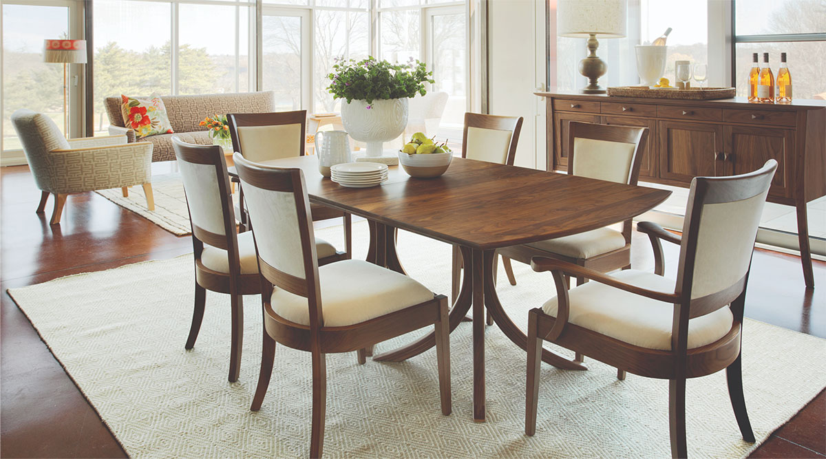 dark wood table and chairs with white fabric