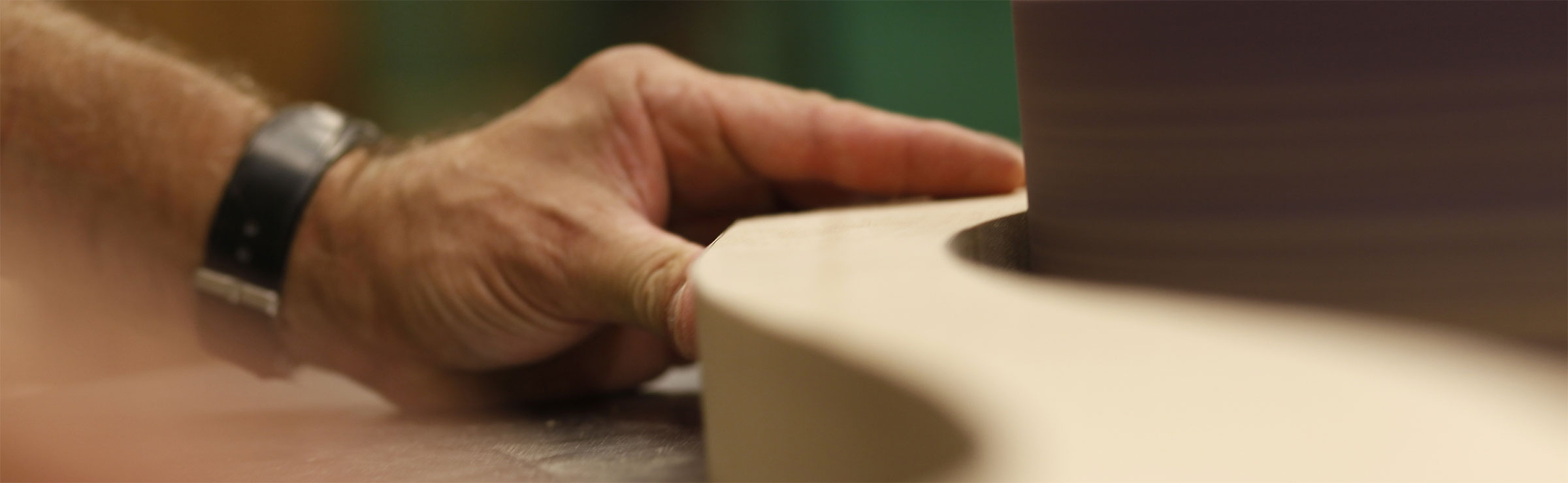   a man's hands wood working