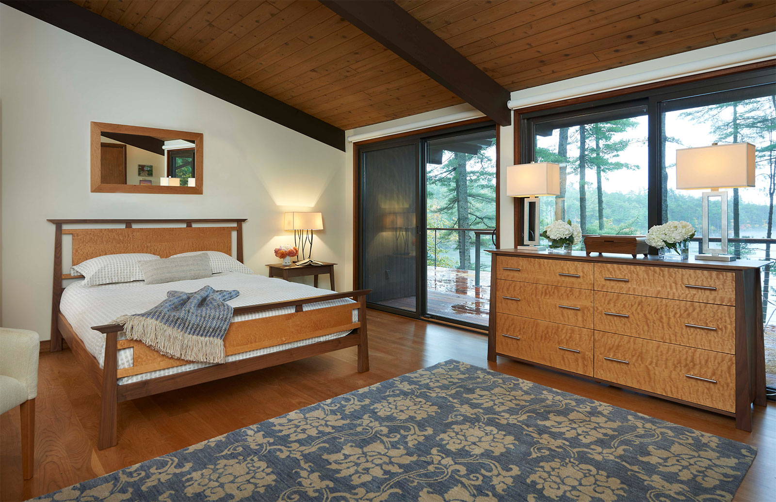 Bed and dresser in walnut and quilted maple.