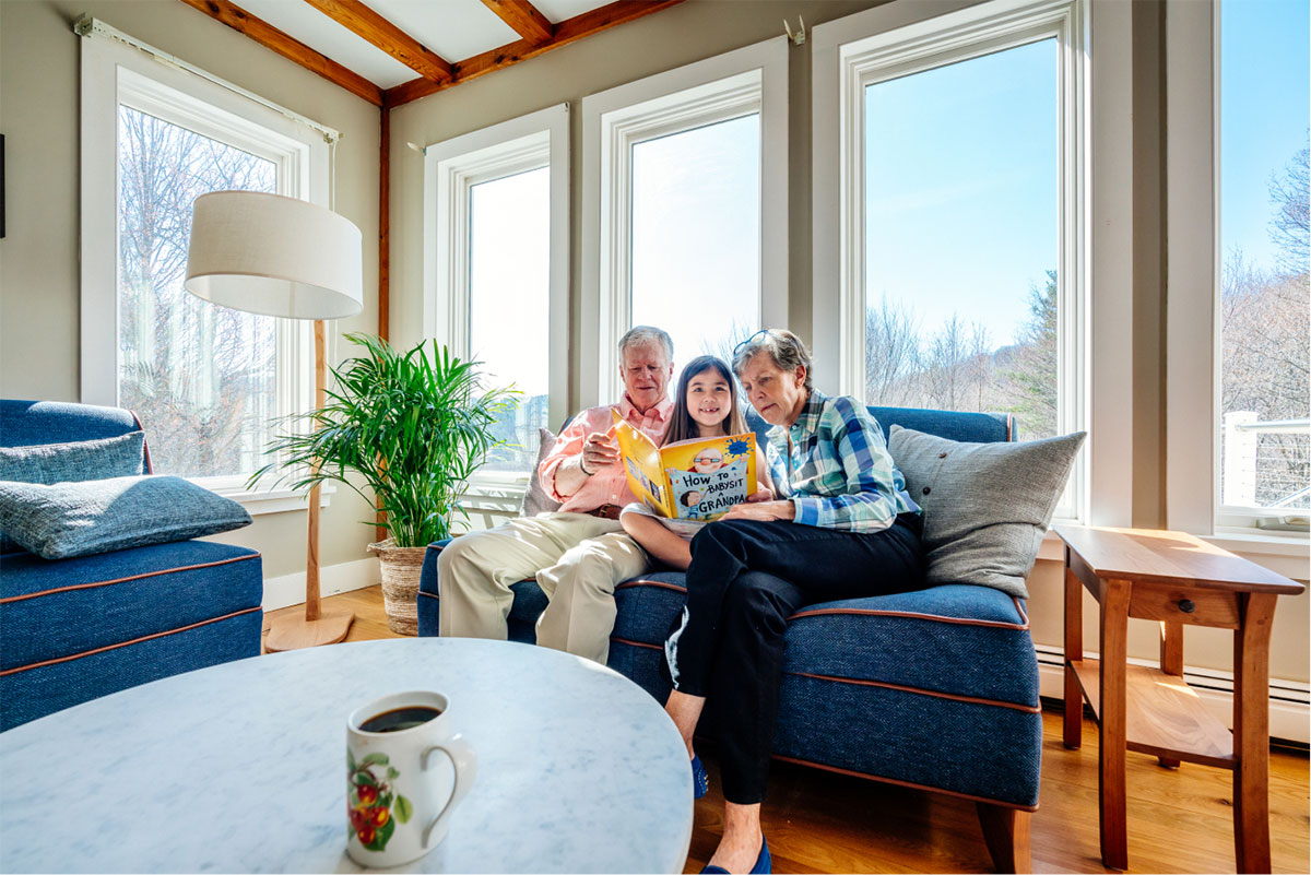 grandparents reading with child