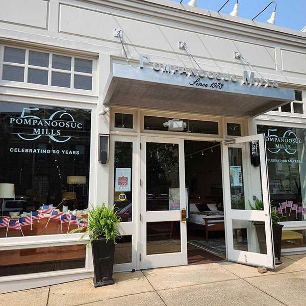 store front with a now open sign