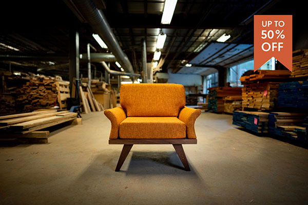 modern orange chair in a woodshop