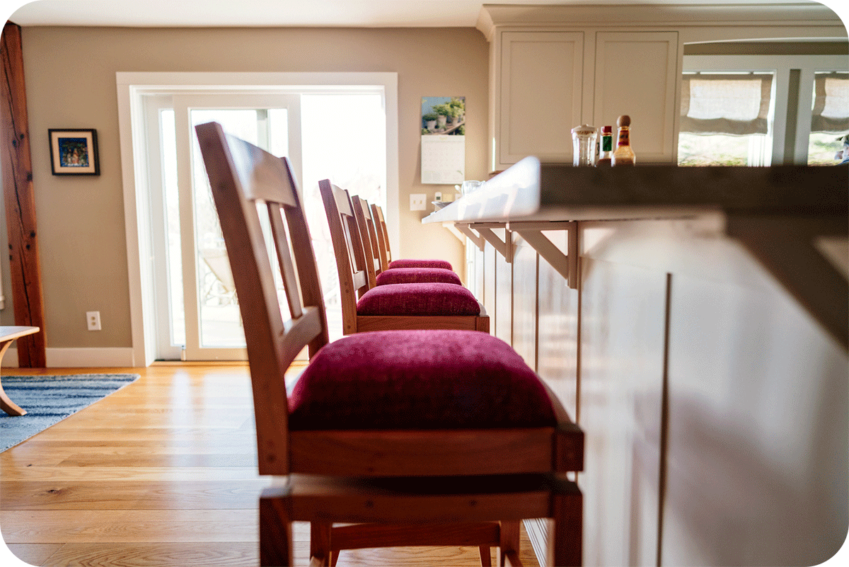 row of barstool at kitchen counter