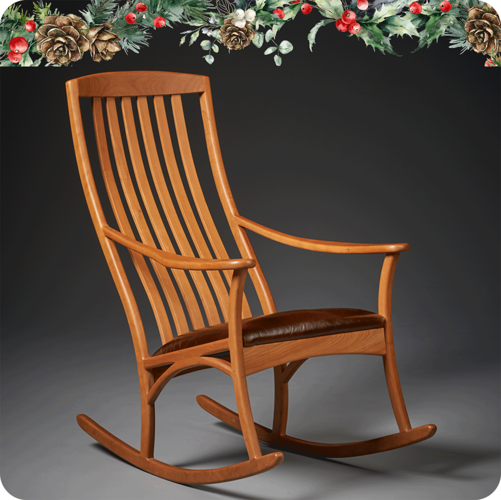 a cherry rocker with leather seat