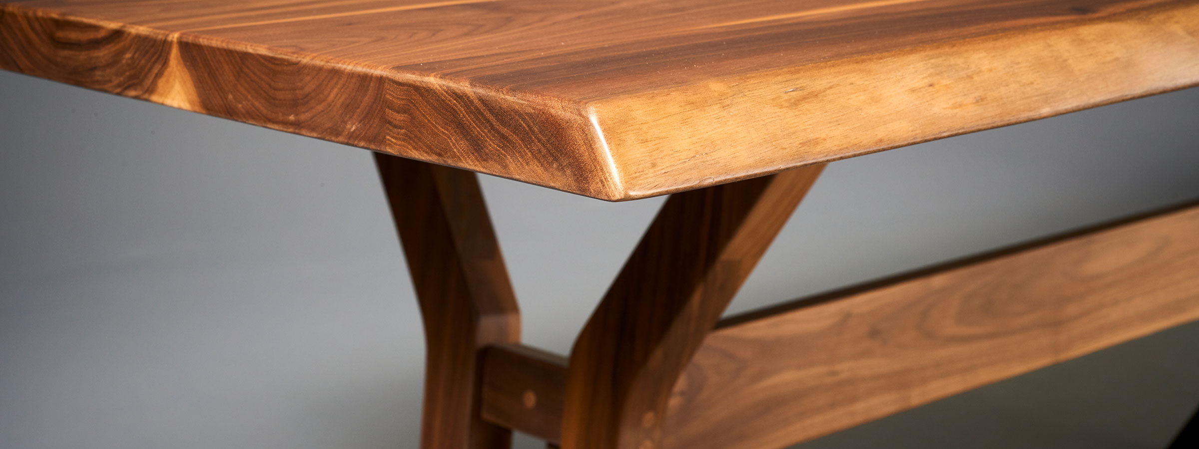close up of walnut live edge table top