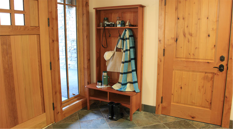 wooden hall tree with tote bag hanging