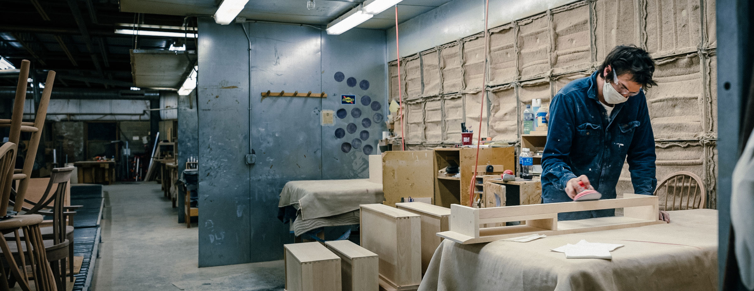 man working in wood shop