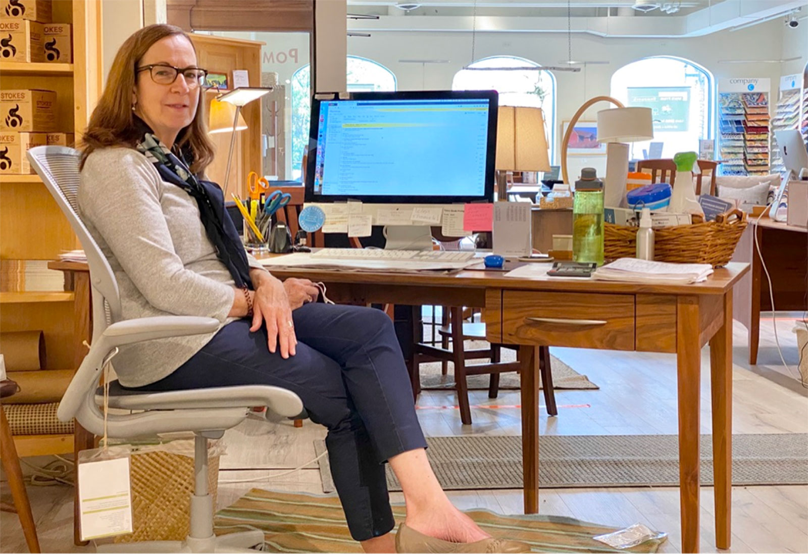 woman in front of computer monitor