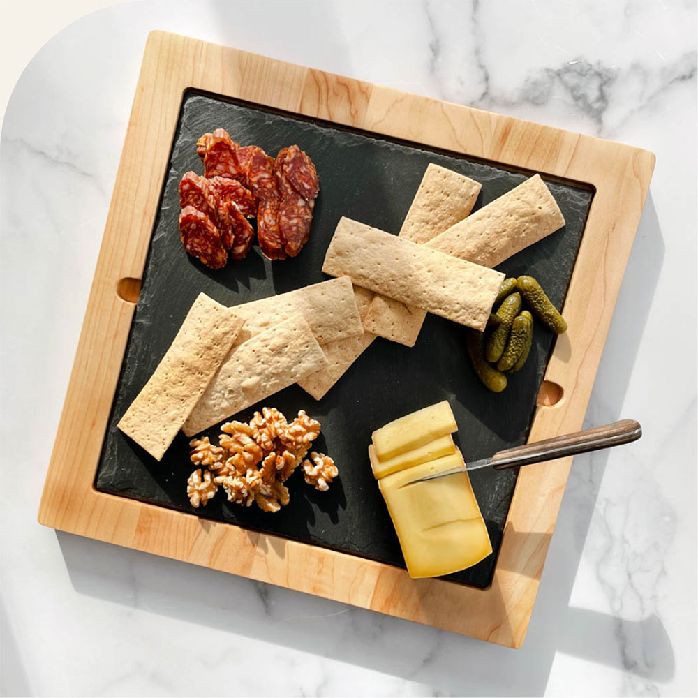 wood framed slate platter with cheese and crackers