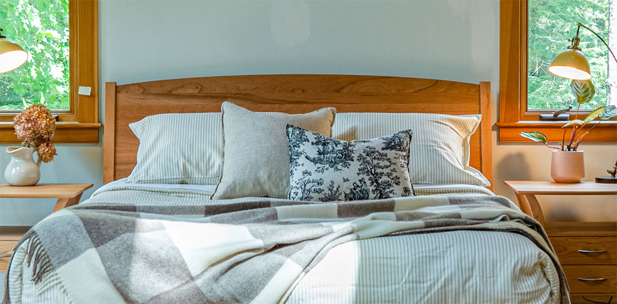 bed with decorative pillows