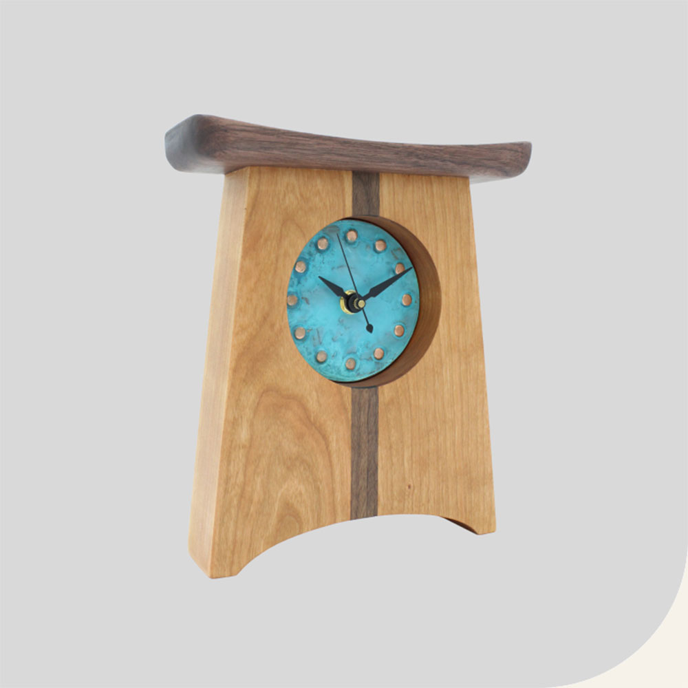 wooden clock with turquoise patina face